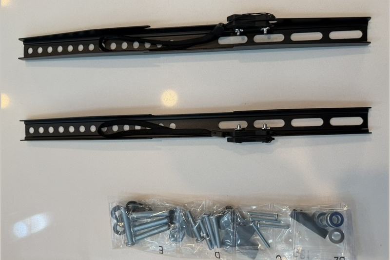 Mounting arms and hardware bag